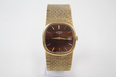 Lot 660 - A GENTLEMAN'S ROTARY GOLD TONE TIGERS EYE...