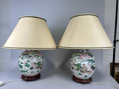 Lot 696 - A PAIR OF LARGE CHINESE JAR AND COVERS ADAPTED...