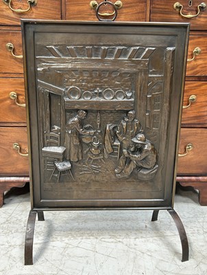 Lot 707 - A METAL FIRE SCREEN DEPICTING A DOMESTIC SCENE...