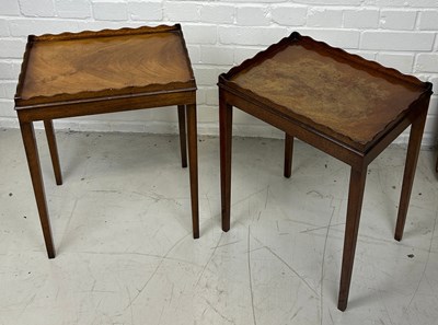 Lot 709 - A PAIR OF MAHOGANY SIDE TABLES WITH WAVE CUT...