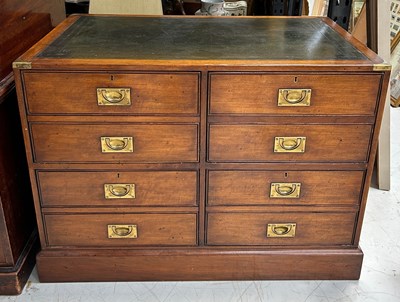 Lot 712 - A MAHOGANY CAMPAIGN CHEST OF DRAWERS WITH...