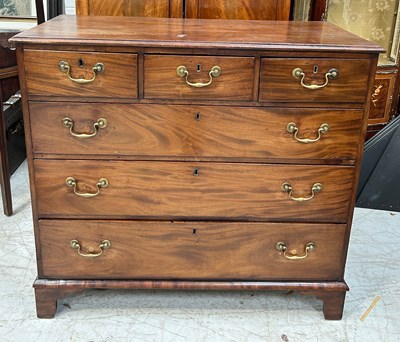 Lot 717 - A GEORGIAN MAHOGANY CHEST OF DRAWERS, 

Three...