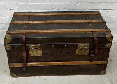 Lot 757 - A LEATHER AND BRASS BOUND TRAVEL TRUNK, 

80cm...