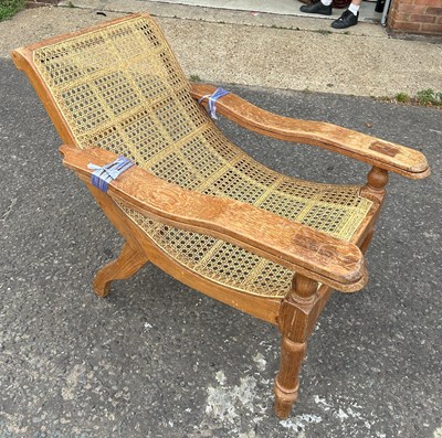 Lot 763 - A LARGE PLANTATION ARMCHAIR, 

130cm x 85cm x...