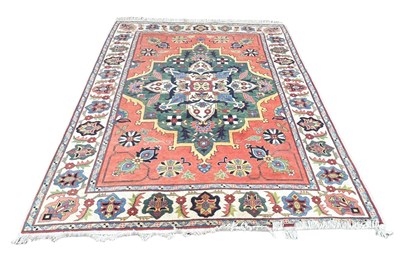 Lot 850 - A PERSIAN DESIGN CARPET,

300cm x 220cm