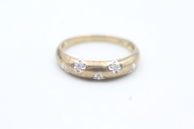 Lot 188 - 9CT GOLD DIAMOND FIVE STONE RING

Weight 1.8g