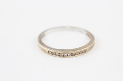 Lot 204 - 9CT GOLD DIAMOND HALF ETERNITY RING 

Weight 1.9g