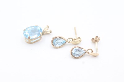 Lot 217 - 9CT GOLD BLUE TOPAZ PENDANT AND EARRINGS...