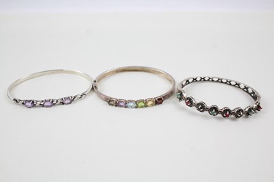 Lot 228 - COLLECTION OF STERLING SILVER GEMSTONE BANGLES...