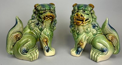 Lot 253 - A PAIR OF CHINESE SANCAI GLAZED FOO...