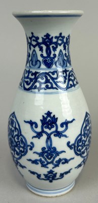 Lot 258 - A SMALL CHINESE BLUE AND WHITE VASE, 

Six...