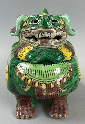 Lot 275 - A CHINESE SANCAI GLAZED TEMPLE LION WITH...