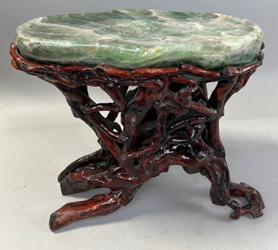 Lot 276 - A CHINESE ROOTWOOD TABLE WITH GREEN STONE TOP...