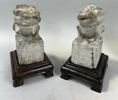 Lot 279 - A PAIR OF CARVED STONE TEMPLE LIONS WITH...