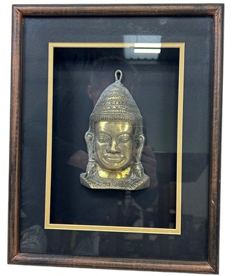 Lot 437 - A BRONZE BUDDHA HEAD, 

20cm x 11cm 

Framed...