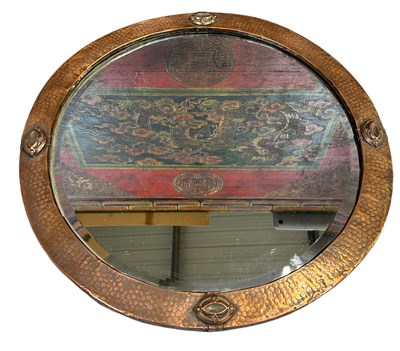 Lot 1113 - AN ARTS AND CRAFTS COPPER WALL MIRROR IN THE MANNER OF LIBERTY AND CO