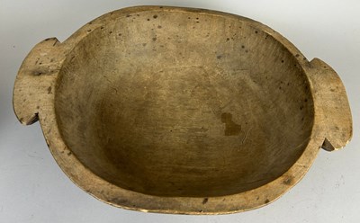 Lot 467 - A TREEN BOWL WITH TWO HANDLES, 

51cm x 38cm