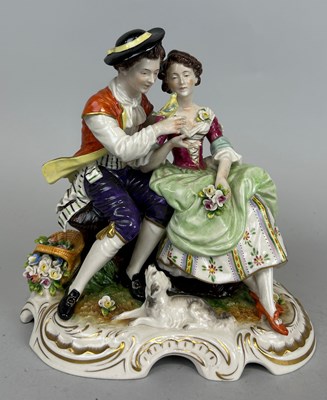 Lot 469 - A DRESDEN PORCELAIN GROUP DEPICTING A LADY AND...