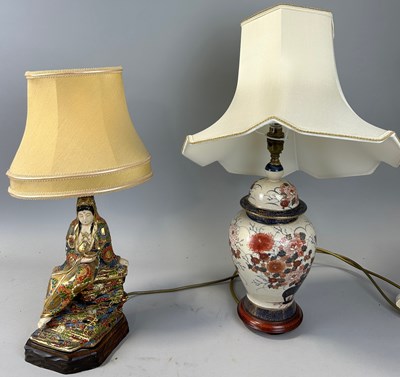 Lot 500 - A JAPANESE CERAMIC LAMP IN THE FORM OF A LADY...