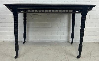 Lot 570 - AN EBONISED AESTHETIC MOVEMENT TABLE AFTER E.W....