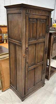 Lot 599 - AN OAK ARTS AND CRAFTS CUPBOARD,

172cm x 77cm...