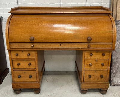 Lot 611 - A VICTORIAN OAK ROLL TOP PEDESTAL DESK,...