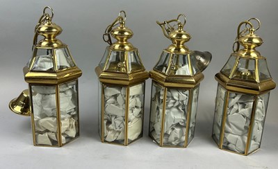 Lot 640 - A SET OF FOUR BRASS AND GLASS PANELLED...