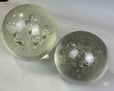 Lot 643 - TWO CRYSTAL BALLS,

Largest 17cm D