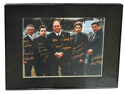 Lot 725 - A PRINTED PHOTOGRAPH OF THE SOPRANOS CAST WITH...