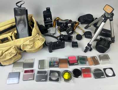 Lot 829 - A NIKON F3 CAMERA WITH ACCESSORIES, LENSES...