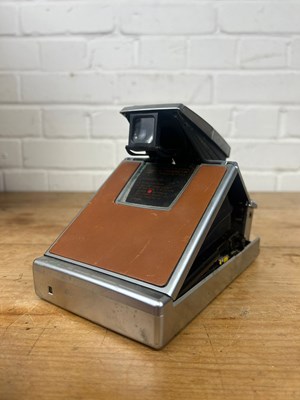 Lot 829A - A POLAROID SX-70 LAND CAMERA