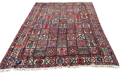 Lot 846 - A LARGE PERSIAN GARDEN DESIGN CARPET, 

410cm...