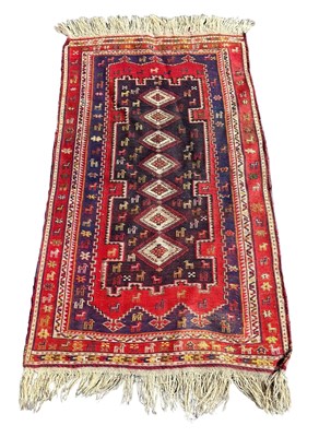 Lot 857 - A PERSIAN DESIGN CARPET, 

150cm x 85cm