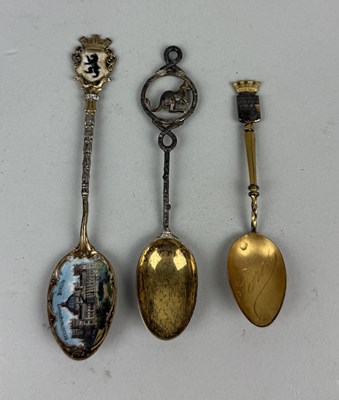 Lot 135 - AN ANTIQUE GERMAN SILVER ENAMELLED 'REICHSTAGSGEBAUDER, BERLIN' SPOON ALONG WITH A SILVER KANGAROO SPOON AND ANOTHER METAL SPOON