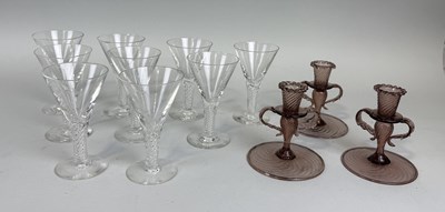 Lot 366 - A SET OF NINE TWISTED STEM GLASSES ALONG WITH THREE CANDLESTICKS