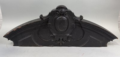 Lot 988 - AN ANTIQUE ARCHITECTURAL FRAGMENT, BLACK PAINTED PEDIMENT WITH 'G' CREST