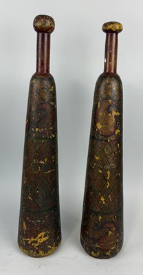 Lot 375 - A PAIR OF POLYCHROME PAINTED WOODEN PINS OR SKITTLES