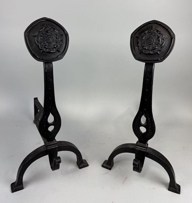 Lot 977 - A PAIR OF CAST IRON FIRE DOGS WITH EMBOSSED TUDOR ROSE