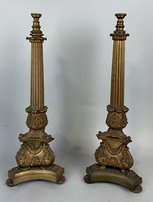 Lot 316 - A NEAR PAIR OF GILDED METAL EMPIRE STYLE TABLE LAMPS