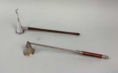 Lot 138 - A SILVER CANDLESNUFFER ALONG WITH A SIMILAR METAL EXAMPLE