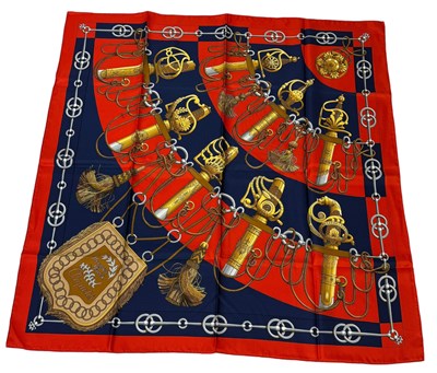 Lot 850 - AN HERMES SILK SCARF WITH SWORD HILT PATTERN