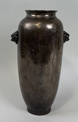 Lot 201 - A CHINESE 19TH CENTURY BRONZE VASE WITH LION HEAD HANDLES