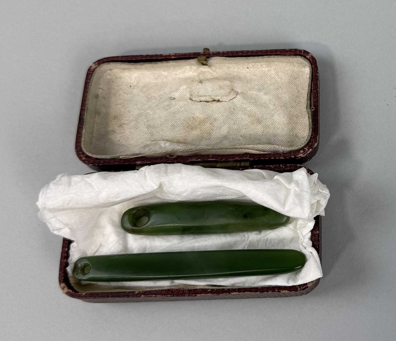 Lot 268 - TWO MAORI NEPHRITE EAR PENDANTS POSSIBLY 19TH CENTURY