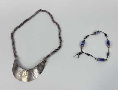 Lot 177 - A HUDSON BAY SILVER FUR TRADE GORGET ALONG WITH MURANO CHEVRON TRADE BEAD NECKLACE