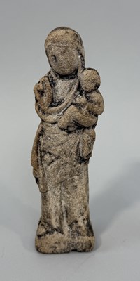 Lot 322 - A MEDEIVAL STYLE LIMESTONE FIGURE OF THE MADONNA AND CHILD