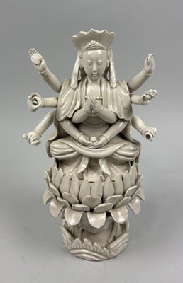 Lot 250 - A CHINESE BLANC-DE-CHINE GUANYIN FIGURE, QING DYNASTY