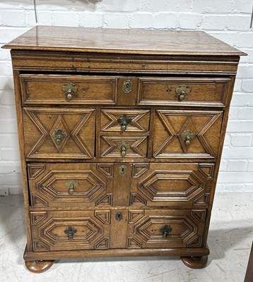 Lot 1024 - A 17TH CENTURY AND LATER GEOMETRIC OAK CHEST OF DRAWERS