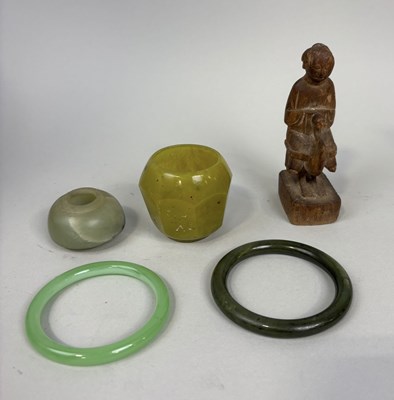 Lot 255 - A COLLECTION OF CHINESE JADE ITEMS TO INCLUDE BANGLES AND ONE WOODEN STATUE.