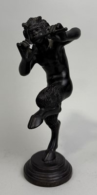 Lot 22 - A BRONZE SCULPTURE OF PAN PLAYING THE PIPES