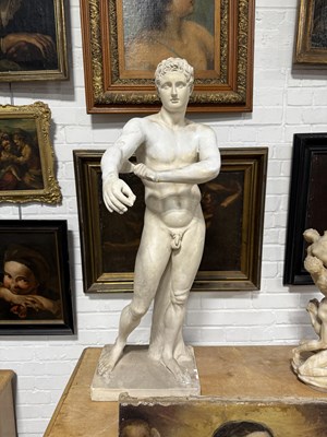 Lot 8 - A PLASTER SCULPTURE OF THE ATHLETE APOXYOMENOS AFTER THE ORIGINAL BY LYSIPPOS